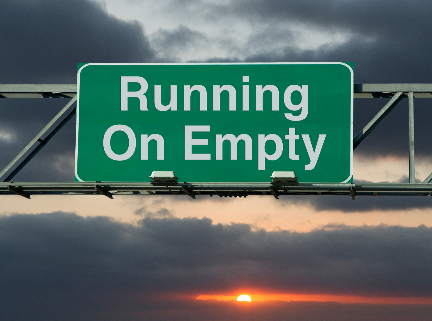 Road sign saying Running on Empty