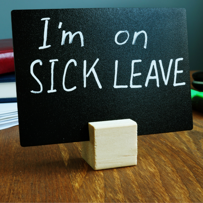 Sick Leave Chalk Board on Desk